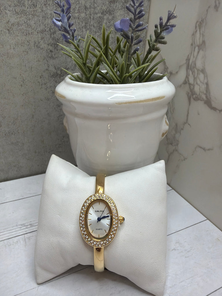 Stones and white bangle watch