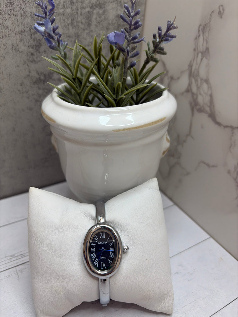 Black and Silver bangle watch