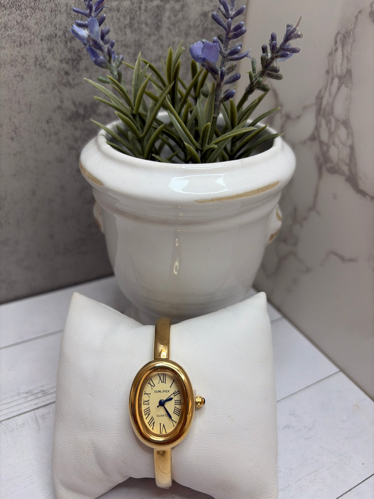 Full gold Bangle watch